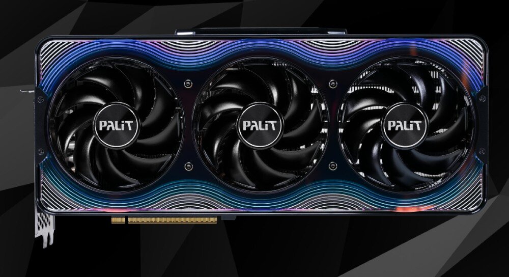 Karta graficzna PALIT GeForce RTX 5090 Gamerock 32GB Widok z góry na kartę graficzną z trzema wentylatorami. Panel zewnętrzny ma wzór falistych linii w odcieniach niebieskiego i fioletu, wygląd, styl, podświetlenie