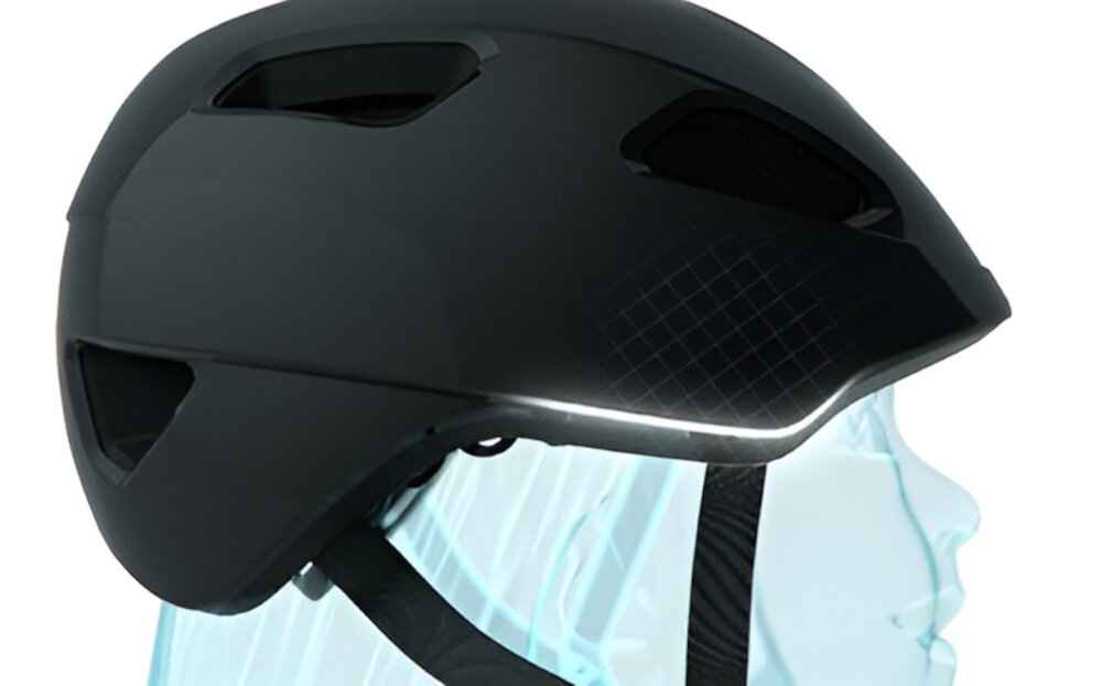 Kask rowerowy LAZER Nutz KinetiCore 2.0 Kropki Zielony dla Dzieci (rozmiar 50-56) kask na białym tle widoczny z boku podświetlona na niebiesko osoba w kasku dodatkowa osłona skroni zwiększa ochronę w newralgicznych miejscach głowy ryzyko urazów podczas upadku lub uderzenia jest znacząco zmniejszone bezpieczeństwo użytkownika lekka konstrukcja z poliwęglanu