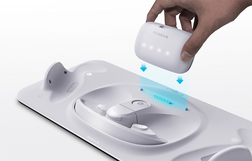 Stacja ładująca BOBOVR D3

			wizualizacja wkładania akumulatora do stacji ładowania na jasnym tle miejsce do ładowania baterii B100 brak plątaniny kabli D3