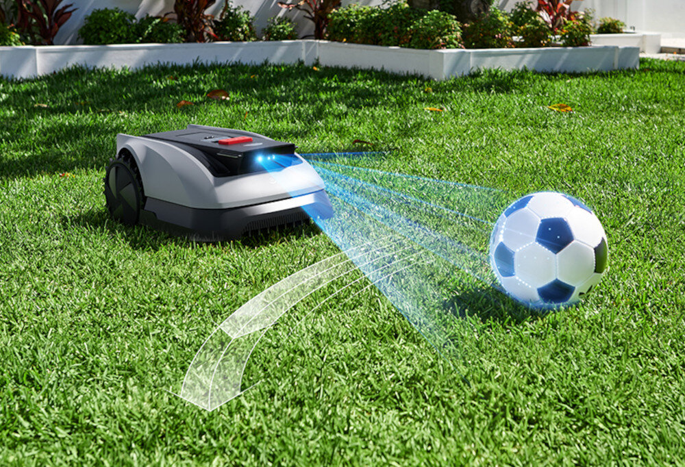 Robot koszący ECOVACS Goat O1200 RTK Szaro-czarny robot na trawi ze świecącymi sensorami wykrywającymi piłkę zaawansowana technologia AIVI 3D oparta na sztucznej inteligencji i 3D ToF LiDAR rozpoznawanie i omijanie ponad 200 rodzajów przeszkód poziom hałasu 59 dB bezszczotkowy silnik wydajność długa żywotność