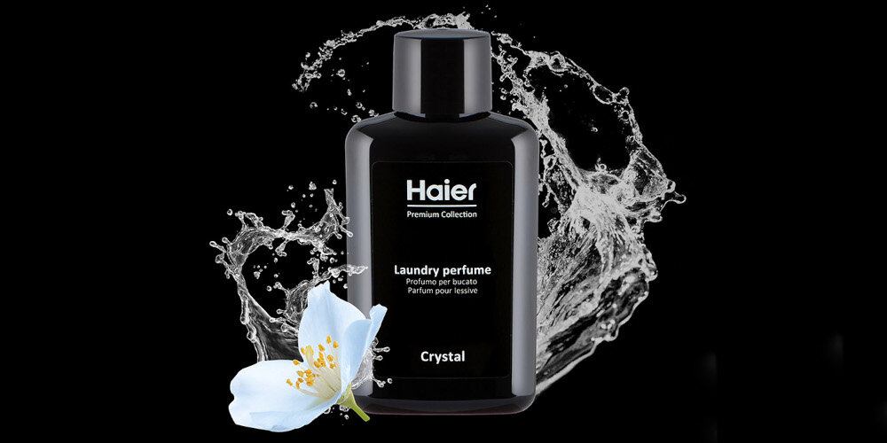 Perfumy do prania HAIER Crystal HPCC10 100 ml kwiat czarne tło woda wizualizacja Zmysłowa świeżość prania Orzeźwiająca mork bryza soczysta słodka pomarańcza zielone nuty trwałość głębia róża damasceńska białe kwiaty