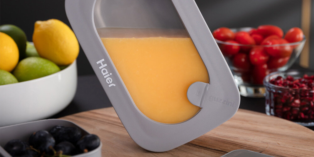 LUNCH BOX HAIER BY GUZZINI HAGCB40 zdjęcie lifestyle sok owoce cytrusy warzywa zamknięty pojemnik 100% szczelności suche płynne produkty Hermetyczne zamknięcie Eliminuje ryzyko wycieków i zabrudzeń