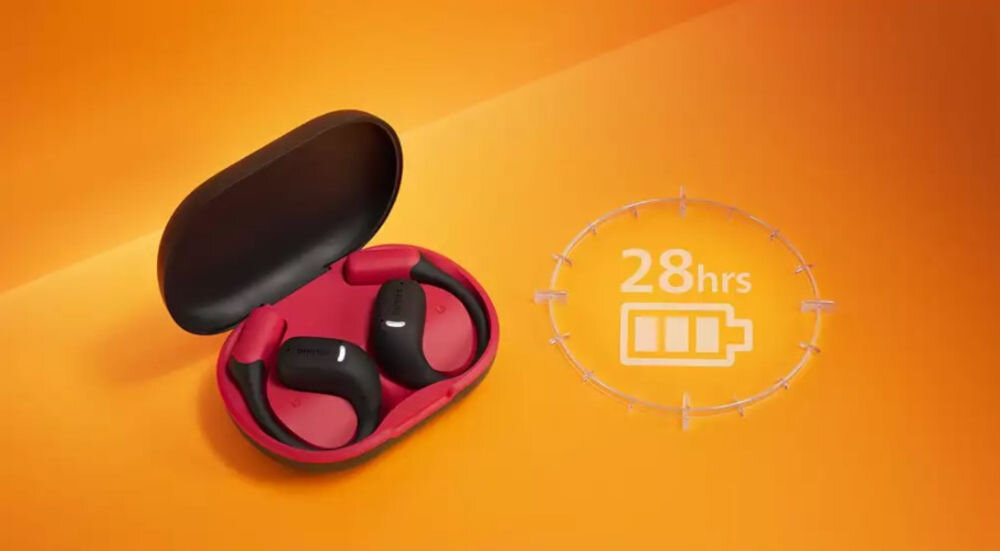 Słuchawki powietrzne PHILIPS TAA6709BK/00 28 godzin odtwarzania etui USB-C szybkie ładowanie, etui ładujące wraz z słuchawkami na pomarańczowym tle z logiem baterii