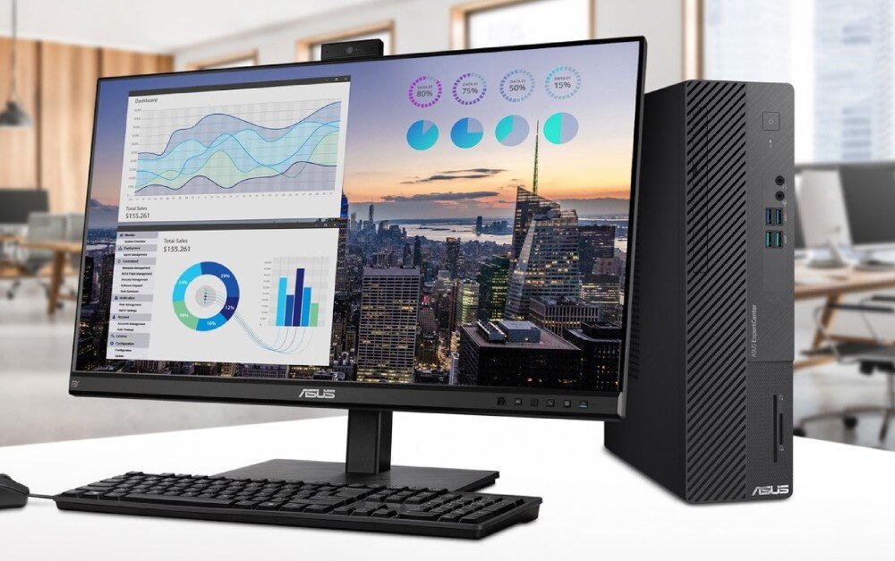 Komputer ASUS ExpertCenter D5 SFF D500SE Stanowisko komputerowe na białym blacie z monitorem wyświetlającym wykresy biznesowe, klawiaturą, myszką i stojącą obok jednostką centralną