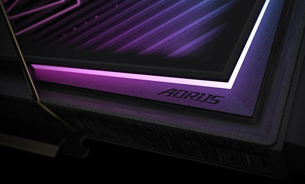 Karta graficzna GIGABYTE Aorus GeForce RTX 5090 Xtreme Waterforce 32GB Karta graficzna AORUS z systemem chłodzenia wodnego, podświetlonymi wentylatorami i przewodami chłodzenia cieczą na tle futurystycznego, niebiesko-fioletowego wiru