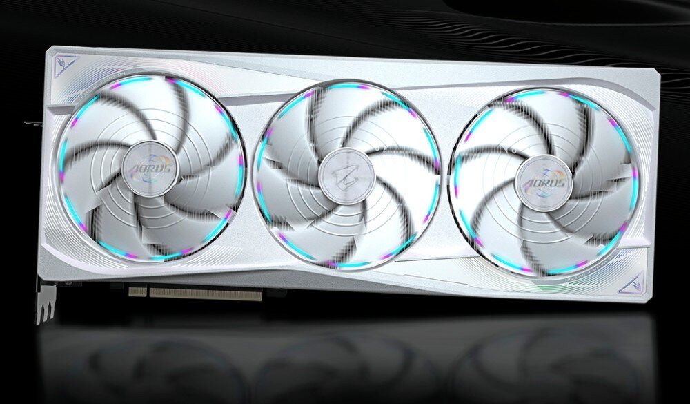 Karta graficzna GIGABYTE Aorus GeForce RTX 5090 Master Ice 32GB Frontalny widok karty graficznej z trzema dużymi wentylatorami i podświetleniem RGB na ciemnym tle, chłodzenie, wentylatory, temperatura