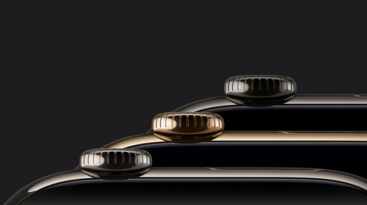 Obraz przedstawia trzy zegarki z widocznymi koronkami w różnych kolorach: czarnym, złotym i srebrnym, na ciemnym tle.