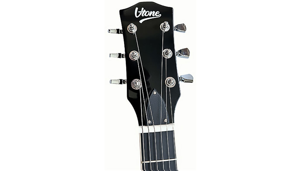 Gitara elektryczna V-TONE VLP1 BK 4/4 z korpusem z drewna okoume i gryfem z mahoniu, kadr główki gitary na białym tle