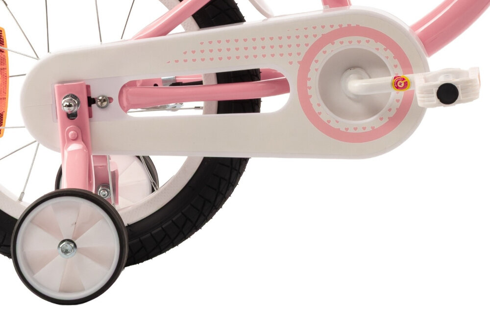 Rower dziecięcy INDIANA Pretty 14 cali dla dziewczynki Różowy zbliżenie na kółka boczne i osłonę łańcucha boczne kółka asekurują dziecko w początkowej fazie nauki łatwy demontaż osłona łańcucha grafika z mnóstwem serduszek