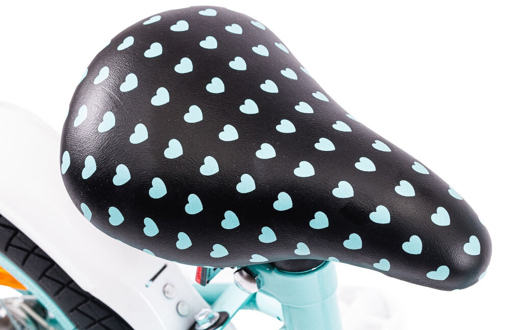 Rower dziecięcy INDIANA Pretty 14 cali dla dziewczynki Miętowy zbliżenie na siodełko bezpieczna satysfakcjonująca aktywność wygodne siodełko serduszka szerokie i grubo wyściełane komfortowa jazda bezpiecznie komfortowo