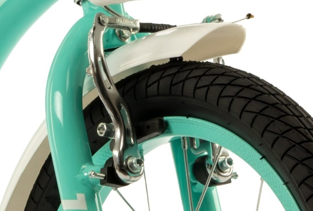 Rower dziecięcy INDIANA Pretty 16 cali dla dziewczynki Miętowy zbliżenie na przedni hamulec podstawa bezpieczeństwa przedni hamulec V-Brake tylny hamulec nożny lekkie duża siła hamowania reflektory odblaskowe na szprychach kierownicy i pod siodełkiem dobrze widoczne na drodze bezpieczne