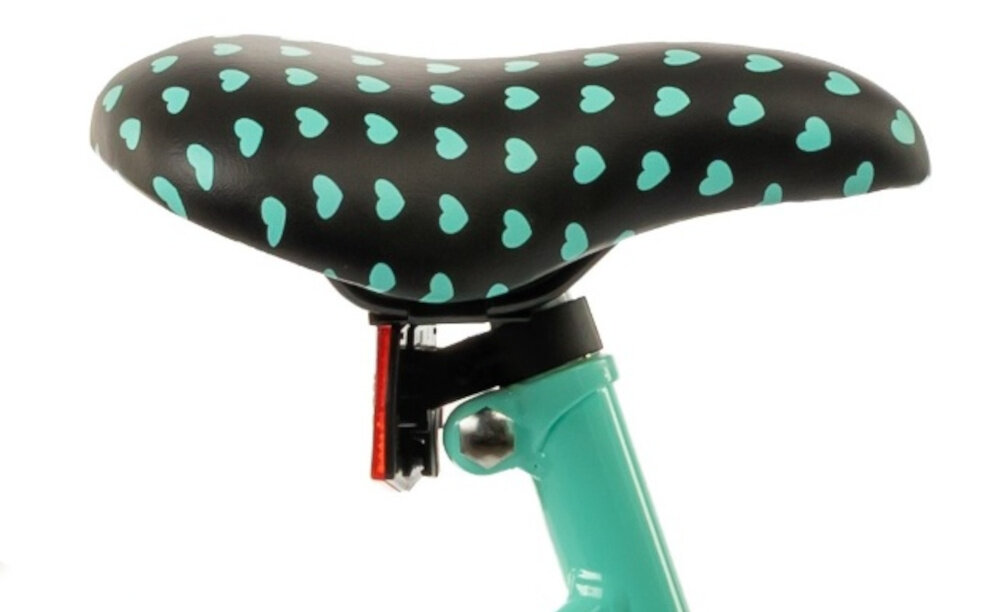 Rower dziecięcy INDIANA Pretty 16 cali dla dziewczynki Miętowy zbliżenie na siodełko bezpieczna satysfakcjonująca aktywność wygodne siodełko serduszka szerokie i grubo wyściełane komfortowa jazda bezpiecznie komfortowo