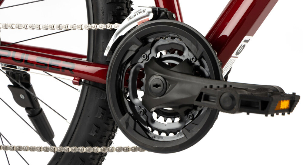 Rower górski MTB INDIANA X-Pulser 1.9 M17 29 cali męski Czerwony zbliżenie na korbę wolnobieg i łańcuch stalowa i wydajna konstrukcja korby marki INDIANA wolnobieg BEST typu 14-28z solidność wytrzyma bardzo duży nacisk na pedały