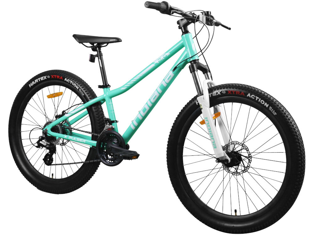 Rower młodzieżowy w kolorze miętowo-białym z widocznym napisem \'Indiana\' na ramie. Opony mają napis \'HARTEX XTRA ACTION\'.