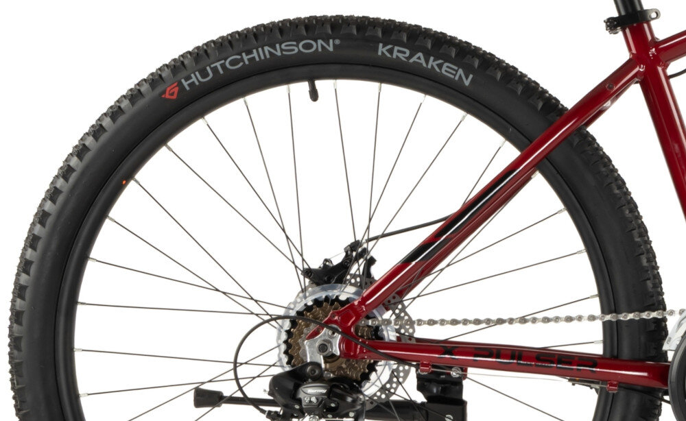 Rower górski MTB INDIANA X-Pulser 1.9 M21 29 cali męski Czerwony zbliżenie na oponę rozmiar koła 29 cali łatwe pokonywanie przeszkód duży kontakt koła z podłożem szerokie opony marki HUTCHINSON dobra przyczepność aluminiowe obręcze zachowanie regularnego kształtu kół stabilne trzymanie opony bezpieczna i komfortowa jazda regularne sprawdzanie ciśnienia powietrza wartość na bocznej części opony