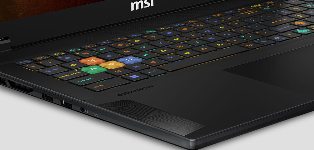Laptop MSI do gier z efektowną, kolorową klawiaturą, łączący wydajność z atrakcyjnym wyglądem. system dźwiękowy z czarną, chromowaną siatką