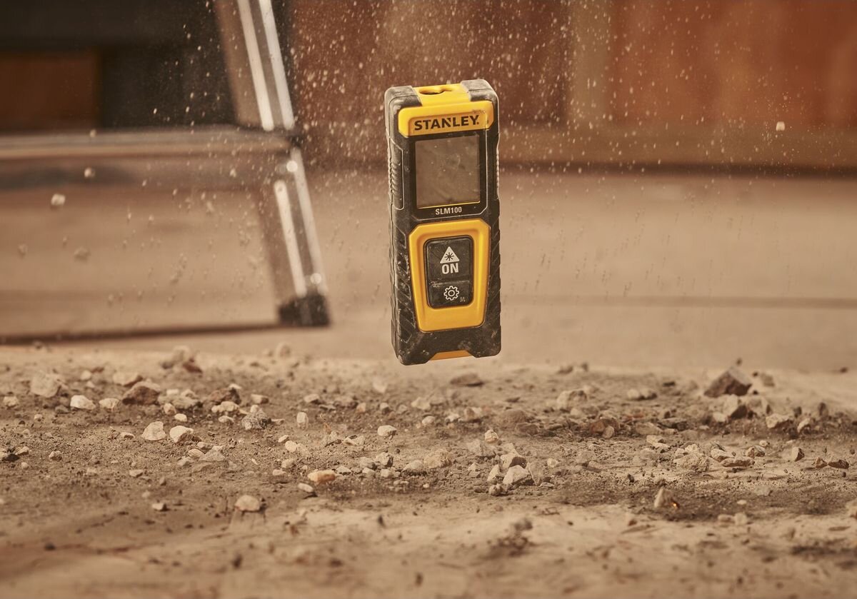 Dalmierz laserowy STANLEY SLM100 STHT77100-0 30m, upadek 1m, IP40, pył, budowa, dalmierz upada na ziemię
