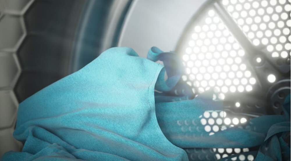 SUSZARKA MIELE TED645 WP wizualizacja bęben wnętrze niebieska tkanina odzież wpadające światło dostosowanie procesu suszenia Suszenie PerfectDry precyzyjnie wysuszone