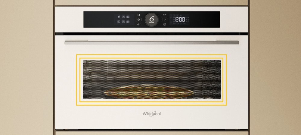 KUCHNIA MIKROFALOWA WHIRLPOOL WMD54MW lifestyle front zamknięta panel funkcje oświetlone wnętrze potrawa w środku logo Funkcje JetStart i Jet Menu błyskawiczne nagrzewanie pełna moc automatyczne dobieranie ustawień