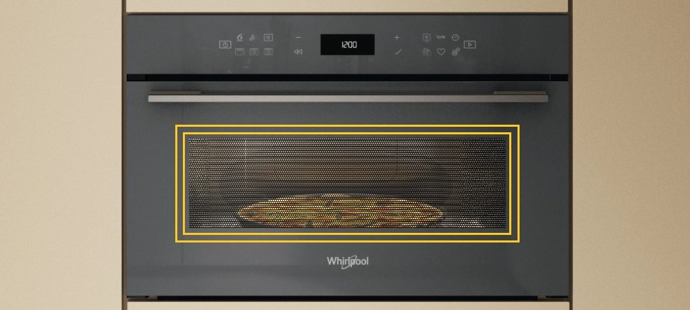 KUCHNIA MIKROFALOWA WHIRLPOOL WMD7O4TSG lifestyle front zamknięta panel funkcje oświetlone wnętrze potrawa w środku logo Funkcje JetStart i JetDefrost błyskawiczne nagrzewanie pełna moc automatyczne dobieranie ustawień