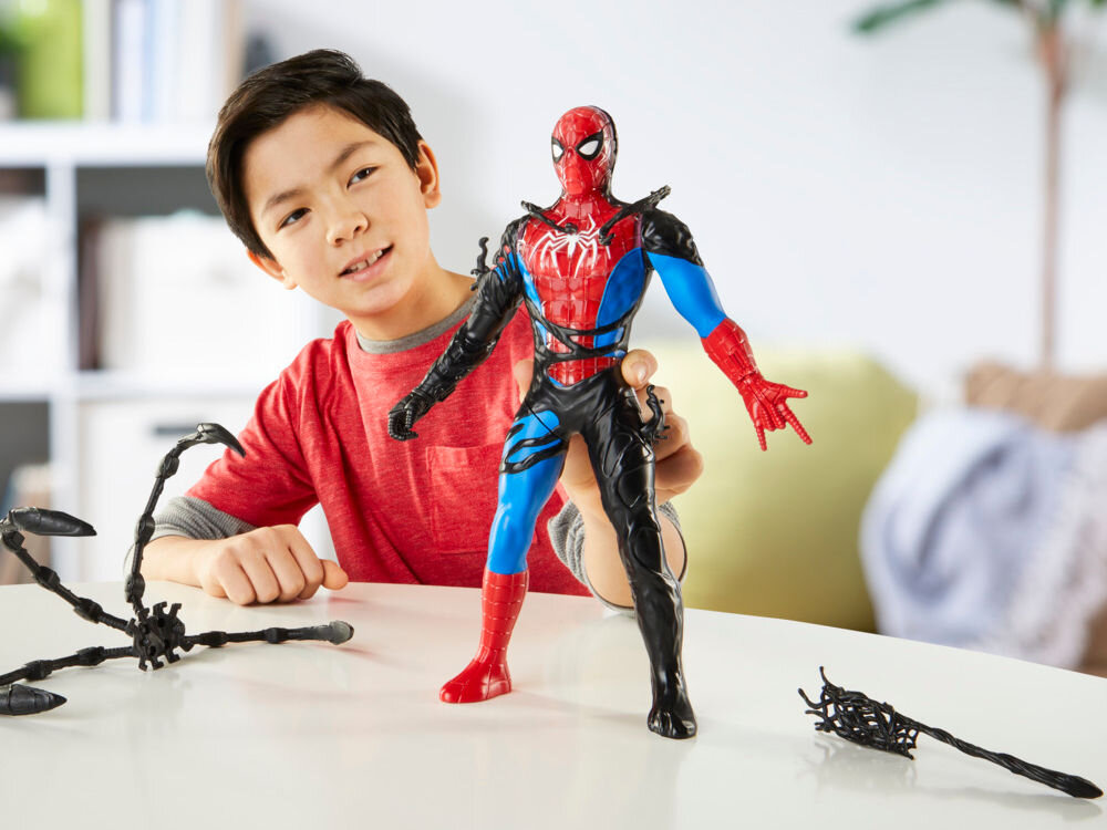 Figurka MARVERL Spider-man Venomversus Liquid Shifter G07285L0 dziecko bawiące się figurką obok akcesoria w stylu venoma