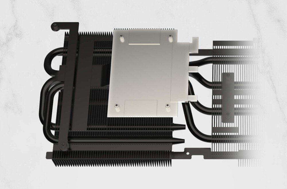 Karta graficzna MSI GeForce RTX 5070 Gaming Trio OC White 12GB DLSS 4 Wnętrze systemu chłodzenia karty graficznej, pokazujące niklowaną miedzianą płytkę bazową oraz gęsto rozmieszczone rurki cieplne i radiatory, miedziana płytka bazowa, ciepłowody, radiator