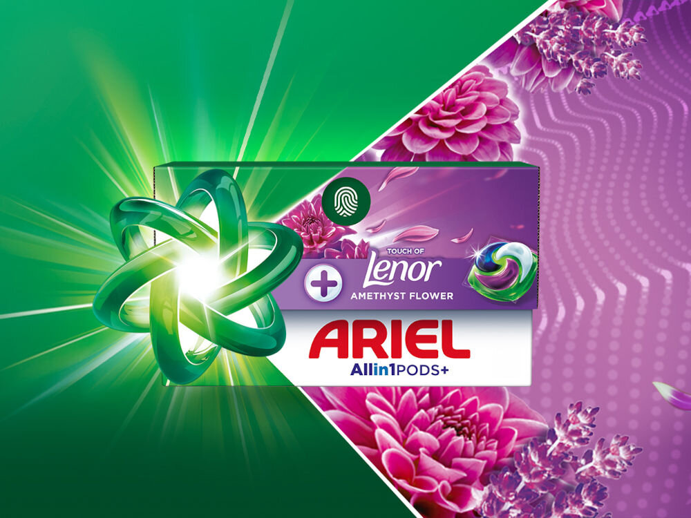 Kapsułki do prania ARIEL Touch Of Lenor Amethyst Flower - 38 szt. Kapsułki Ariel All-in-1 Pods+ z dodatkiem zapachu Lenor Amethyst Flower w opakowaniu ozdobionym kwiatami.