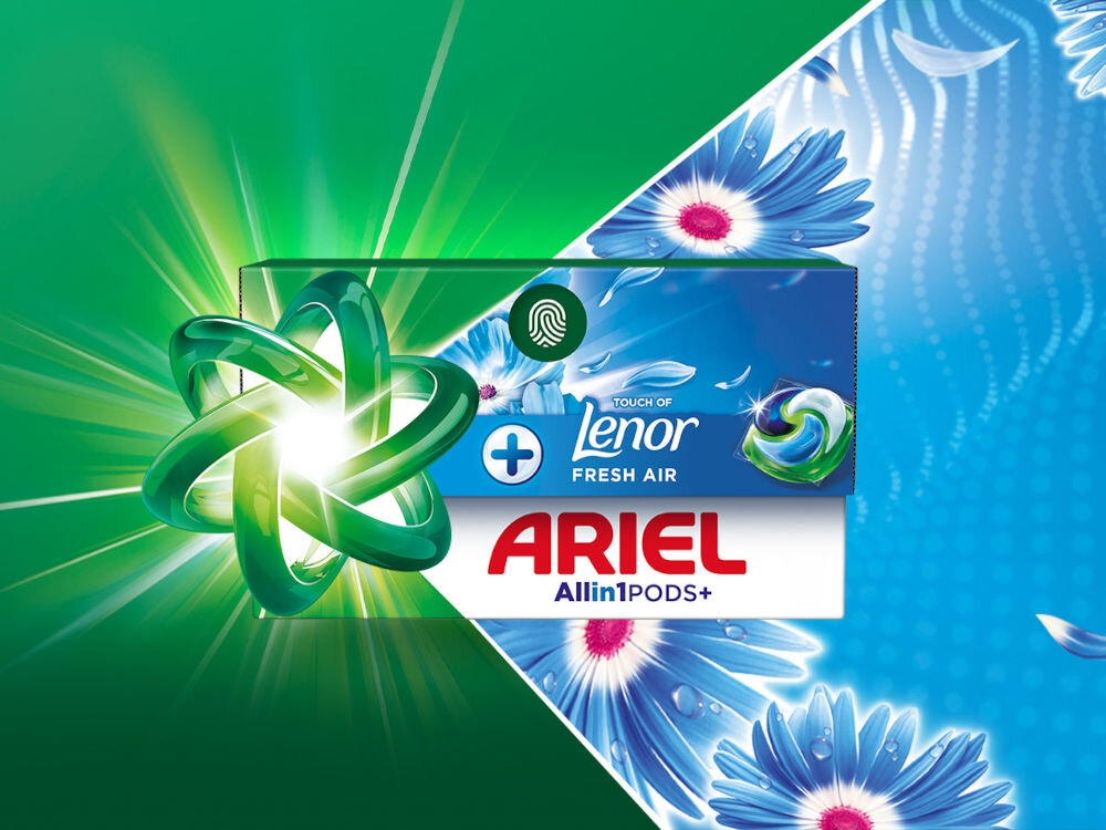 Kapsułki do prania ARIEL Touch Of Lenor Fresh Air - 38 szt. Kapsułki Ariel All-in-1 Pods+ z dodatkiem zapachu Lenor Fresh Air w opakowaniu ozdobionym kwiatami.