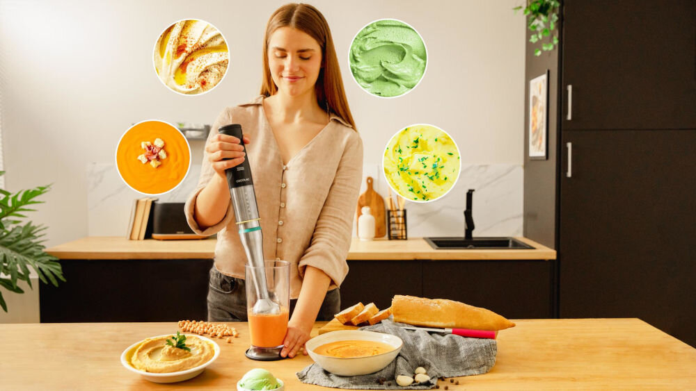 Blender CECOTEC Katana 15 Smash B kobieta trzyma w ręku blender blenduje pomarańczową zawartość w pojemniku pełne rozwinięcie kulinarnej wyobraźni siekanie krojenie miksowanie mieszanie ubijanie wszechstronne urządzenie śniadanie deser kolacja funkcjonalny pomocnik w kuchni liczne końcówki i akcesoria proste inspirujące tworzenie potraw 