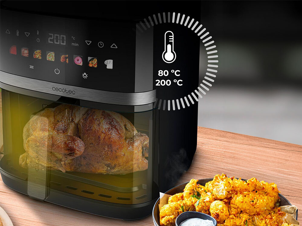 Air Fryer Frytkownica beztłuszczowa CECOTEC Cecofry&Grill Duoheat 8000 frytkownica czarna obudowa ilustracje przyciski wyświetlacz kurczak wewnątrz urządzenia moc 2200 W technologia frytkownicy beztłuszczowej dania z minimalną ilością tłuszczu zaledwie jedna łyżka oleju potrawy o niższej kaloryczności dla osób dbających o zdrowie zdrowe gotowanie jakość smak dań regulacja temperatury w zakresie 80-200 stopni timer kontrola procesu przygotowywania potraw