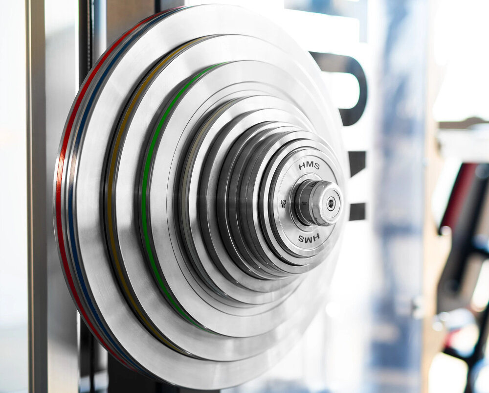 Obciążenie HMS TOS200 (20 kg) siłownia sala ćwiczeń zestaw obciążeń założonych na gryfie centralny otwór o średnicy 50 mm pełną kompatybilność z gryfami olimpijskimi bezpieczeństwo ułatwia szybkie zakładanie i zdejmowanie talerzy