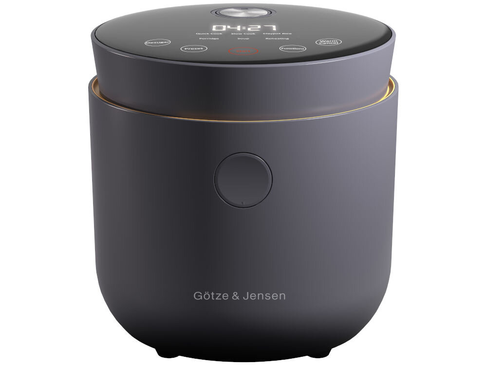 Ryżowar GÖTZE & JENSEN RC500K Ryżowar GÖTZE & JENSEN z widocznym panelem sterowania na pokrywie. Wyświetlacz pokazuje czas '04:27' oraz przyciski funkcyjne takie jak Quick Cook, Slow Cook, Porridge, Soup, Steaming, Warm i Preset.