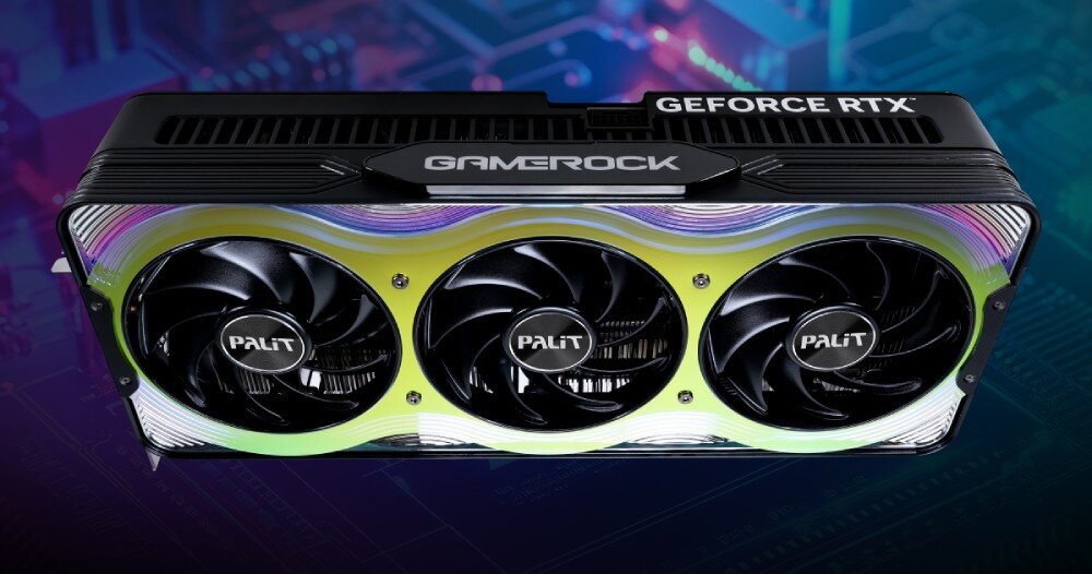 Karta graficzna PALIT GeForce RTX 5070 Ti GameRock OC 16GB Karta graficzna z trzema wentylatorami widoczna z lekkiego boku. Na obudowie znajduje się napis 'GameRock' oraz 'GeForce RTX', a panel przedni mieni się zielono-fioletowym gradientem, wydajność, układ, pamięć, technologia, rdzenie CUDA