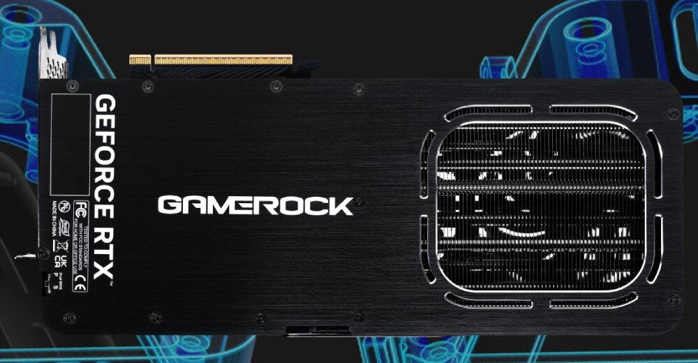Karta graficzna PALIT GeForce RTX 5070 Ti GameRock OC 16GB Widok na tył karty graficznej z napisem 'GameRock'. Powierzchnia jest ciemna i matowa, z wycięciami odsłaniającymi elementy chłodzenia, konstrukcja, ramka, uchwyt