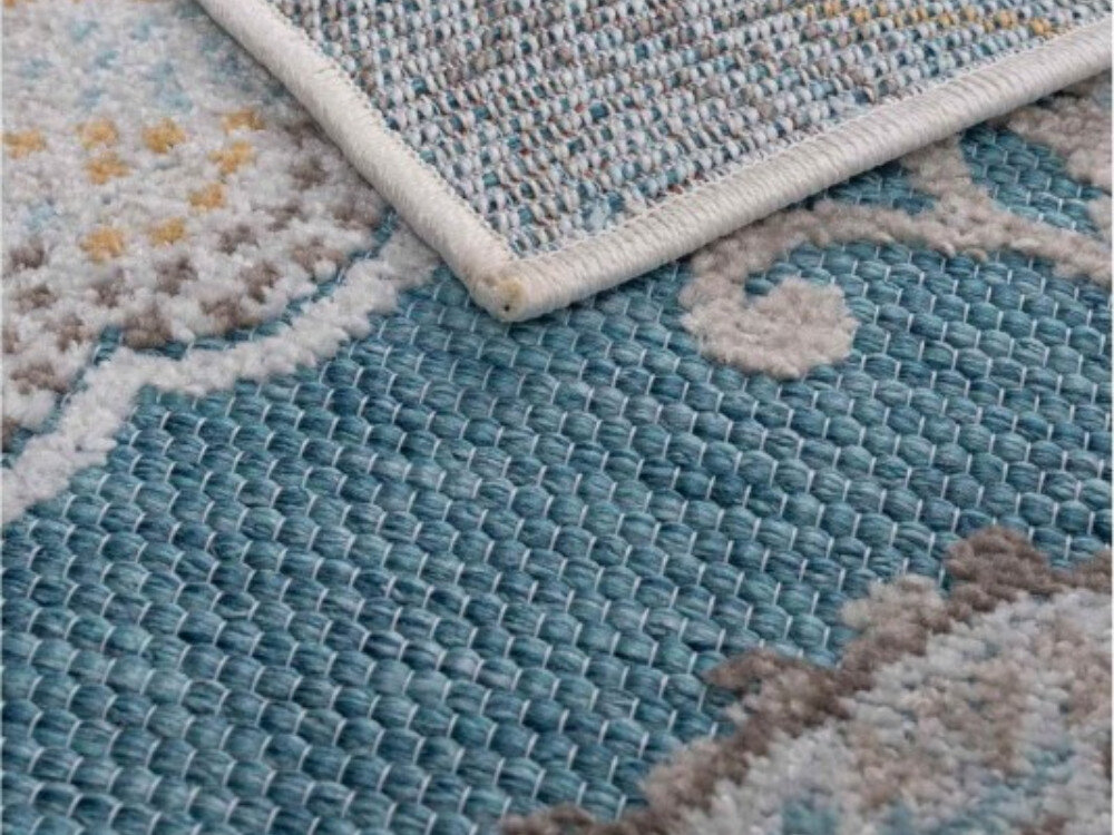 Dywan wewnętrzny MULTIDECOR Piar pnącze 160 x 230cm Turkusowy, płaskotkany, runo, gramatura, wygoda, zbliżenie na strukturę dywanu od spodu i od góry