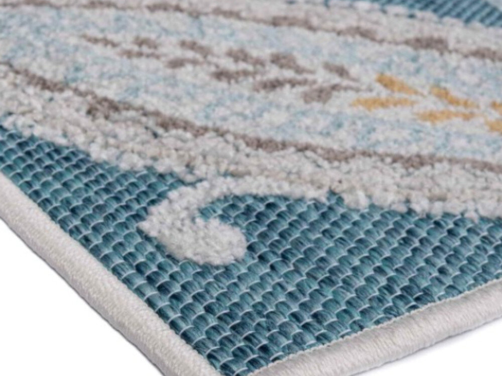 Dywan wewnętrzny MULTIDECOR Piar pnącze 160 x 230cm Turkusowy, antyelektrostatyczny, kurz, alergia, czystość, na białym tle jeden z narożników dywanu