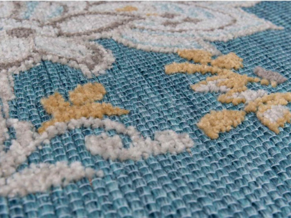 Dywan wewnętrzny MULTIDECOR Piar pnącze 160 x 230cm Turkusowy, wewnętrzny, salon, boho, kształt, zbliżenie na strukturę dywanu