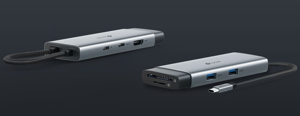 Hub TP-LINK UH7020C Dwa ujęcia tego samego szarego adaptera pokazujące rozmieszczenie portów z obu stron, w tym gniazda USB typu A, HDMI, USB typu C oraz czytnik kart SD i microSD