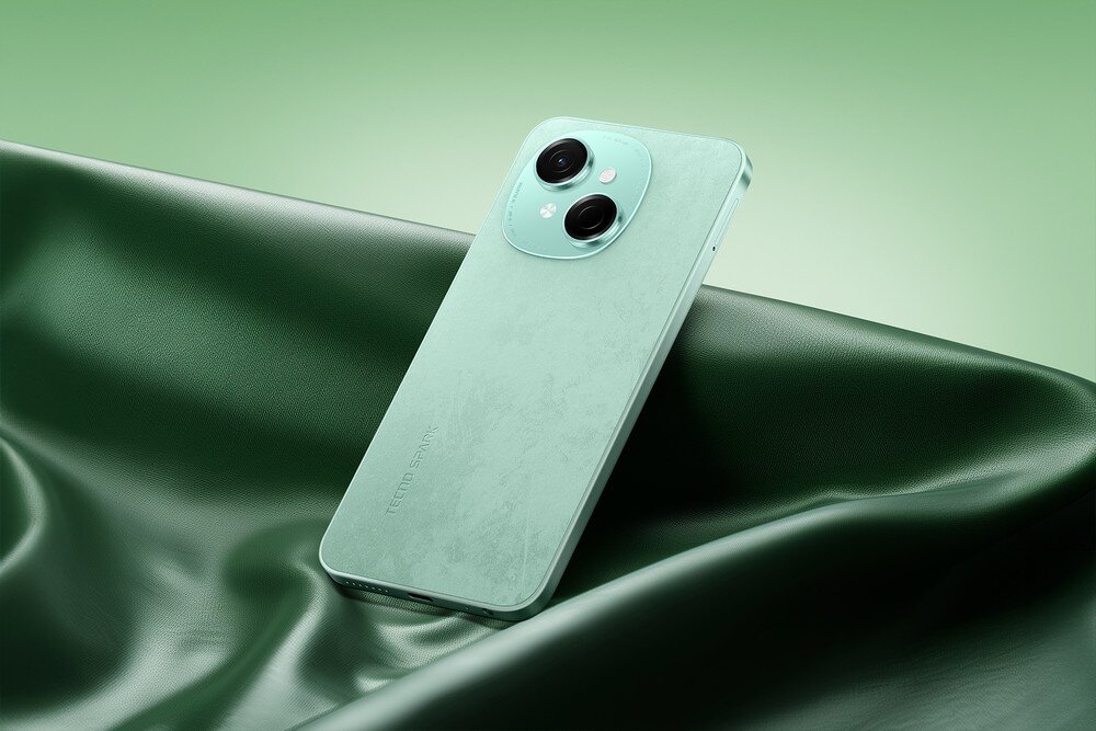 Smartfon TECNO Spark Go 1 na zielonej tkaninie