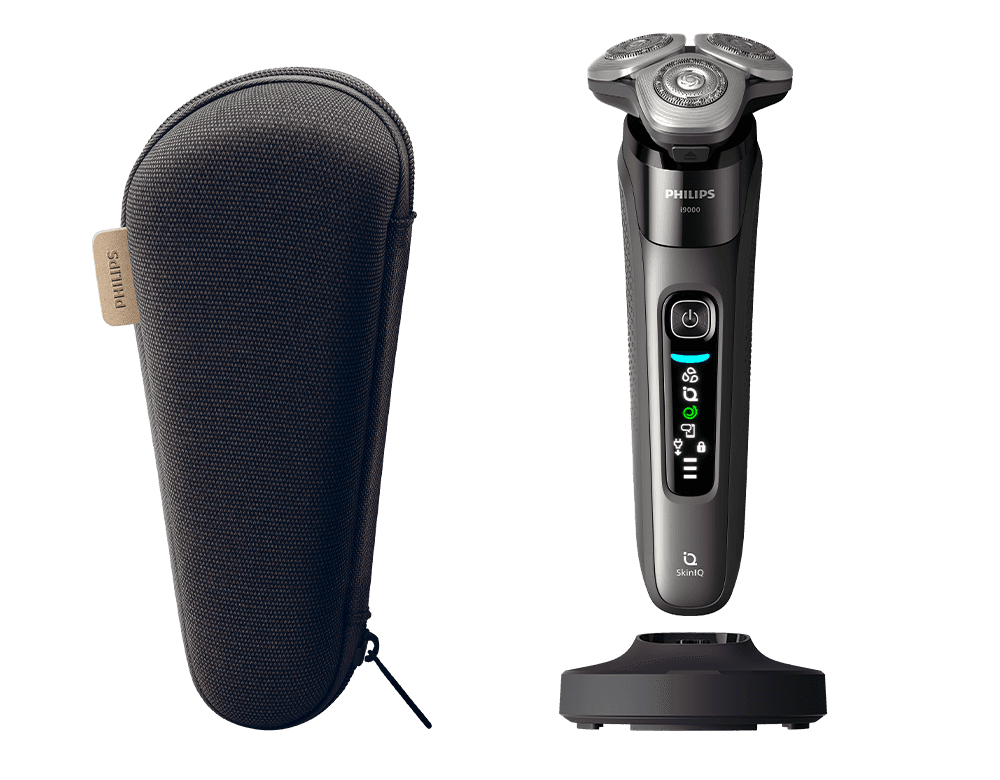 Golarka z akcesoriami - etui i podstawką ładującą.