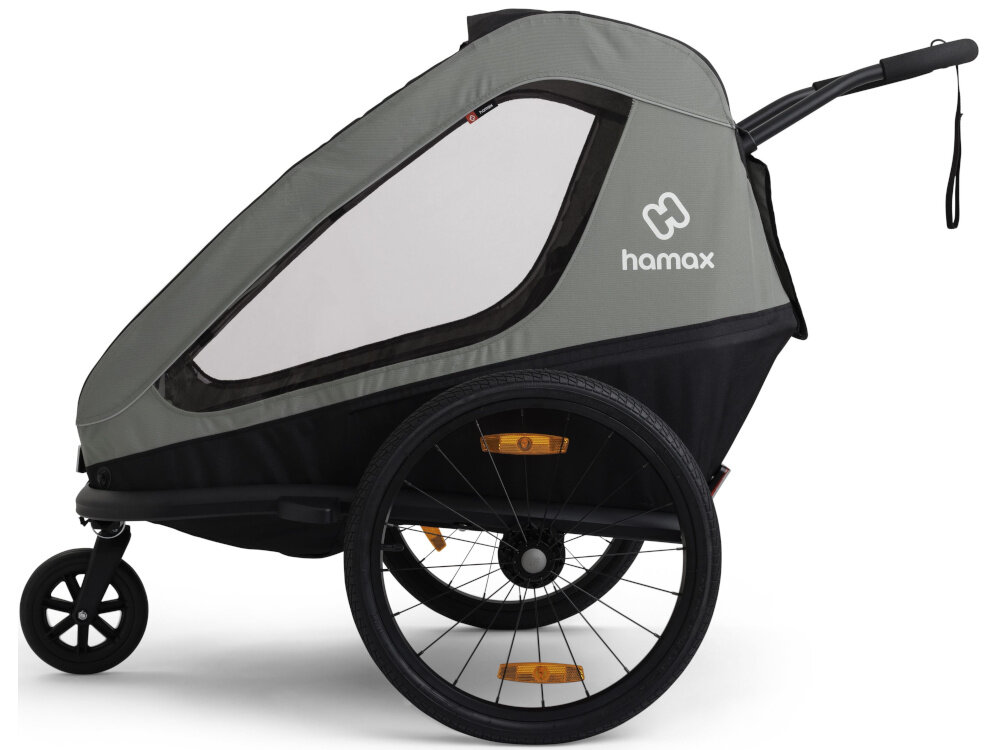 Przyczepka rowerowa HAMAX Traveller Twin Khaki-czarny przyczepka na białym tle widoczna z boku Duże 20-calowe koła płynne prowadzenie Odblaski z przodu, z tyłu i po bokach materiał odblaskowy na bokach i tylnej części konstrukcji Wygodne siedzenia