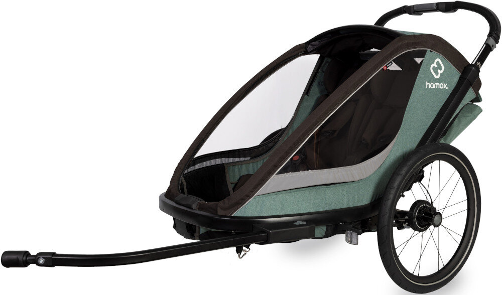 Przyczepka rowerowa HAMAX Cocoon One Zielono-czarny przyczepka na białym tle widoczna od przodu pod skosem Zamykane ramię rowerowe zestaw do transportu za rowerem możliwość przechowywania ramienia pod wózkiem Innowacyjny uchwyt rowerowy Zdejmowane koła konstrukcja przygotowana do różnych trybów użytkowania