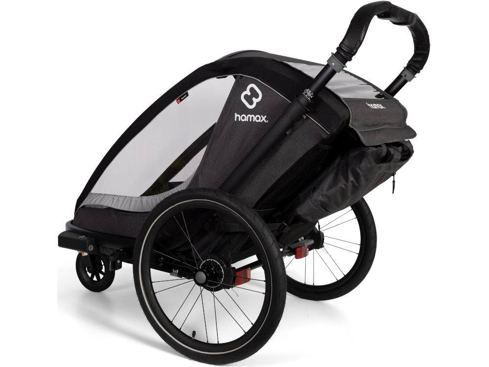 Przyczepka rowerowa HAMAX Cocoon One Szaro-czarny przyczepka na białym tle widoczna od tyłu pod skosem Maksymalna waga dzieci wynosi do 22 kg waga całkowita dziecka i bagażu to 35 kg Maksymalny wzrost dziecka określono na 117 cm minimalny wiek użytkownika w trybie rowerowym to około 9 miesięcy dziecko musi samodzielnie siedzieć zatwierdzony zgodnie z EN15918 i EN1888 Koła z odblaskowymi paskami lampka Presto z baterią CR2032