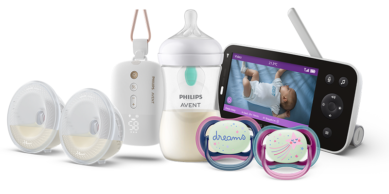Laktator z muszlami, butelka, smoczki i elektroniczna niania Philips Avent.