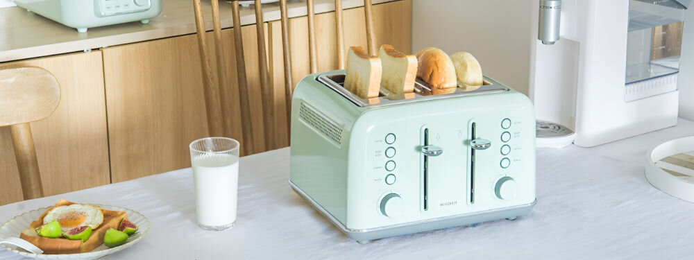 Toster BUYDEEM DT640E Miętowy toster w kolorze miętowym grzanki wewnątrz tostera pokrętła przyciski dźwignie gotowa kanapka na talerzu bezpieczny w użytkowaniu przesuwna dźwignia gotowe pieczywo automatycznie wysuwa się z kieszeni funkcja automatycznego wyłączania bezpieczeństwo użytkowania komfort spokój podczas przygotowywania posiłków