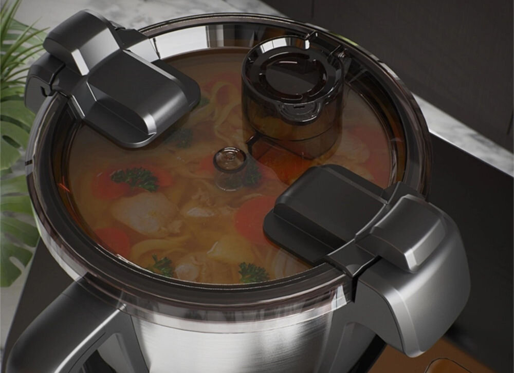 Wielofunkcyjny robot kuchenny AENO ACR0001S GastroLab CR1S (WiFi) z funkcją gotowania, wbudowaną wagą i z dostępem do ponad 150 przepisów ciemna pokrywka widoczna zawartość wewnątrz misy Przezroczysta pokrywa obserwowanie przebiegu gotowania precyzyjny nadzór Możliwość podglądu zawartości miski bez potrzeby otwierania pokrywy i przerywania procesu