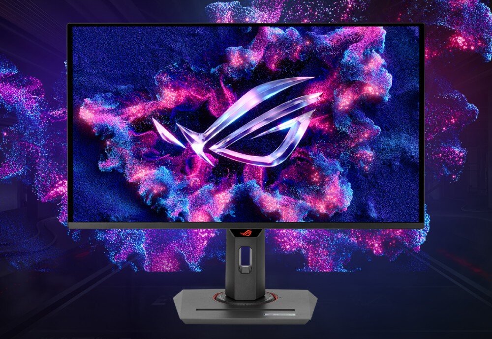 Monitor ASUS ROG Strix OLED XG27UCDMG Monitor gamingowy wyświetlający na ciemnym tle grafikę z logotypem w formie stylizowanego oka na tle fioletowych i niebieskich smug energii, opis