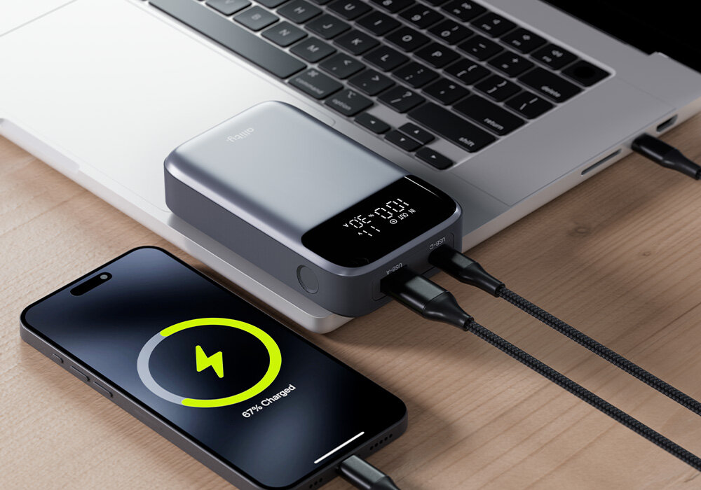 Powerbank ALLITY 33 W 10000 mAh ładowanie urządzeń na stole
