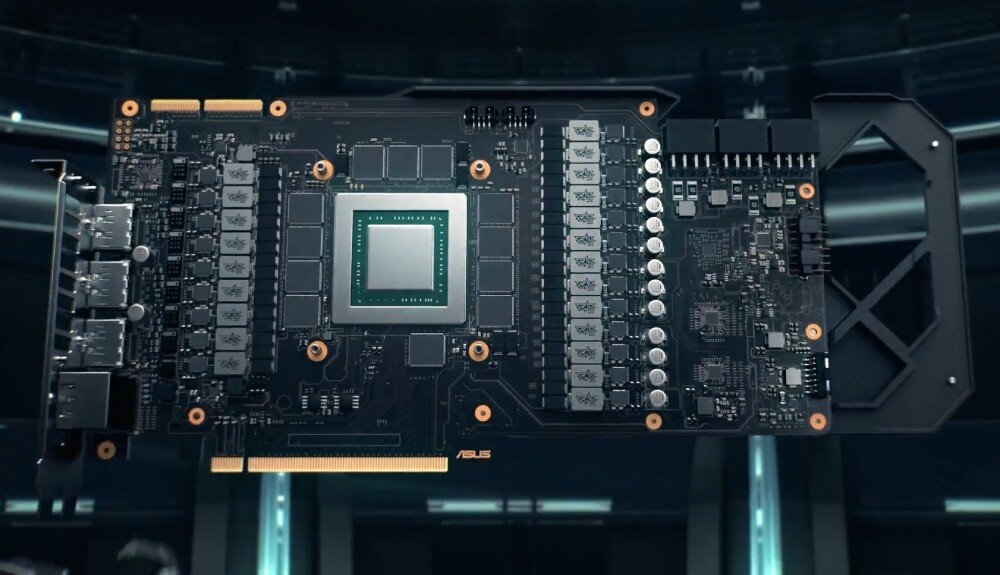 Karta graficzna ASUS TUF Gaming GeForce RTX 5070 OC Edition 12GB Widok na rozłożoną kartę graficzną z odsłoniętym układem GPU i komponentami rozmieszczonymi po obu stronach, produkcja, wykonanie, ramka