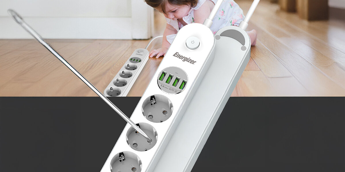 Listwa ENERGIZER EPB2500W00EU (2 m) biały Listwa zasilająca Energizer z podłączonymi kablami ładującymi smartfony (iPhone’y). Pod spodem graficznie podświetlony jest dół listwy i widoczny duży napis '850°C', co wskazuje na ognioodporność obudowy